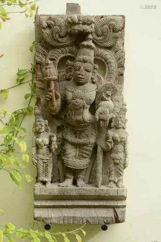 A hardwood carved panel of Vishnu,