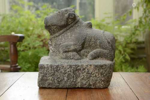 A carved granite figure of Nandi,