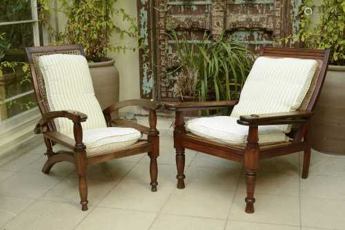 Two similar teak planter's chairs,