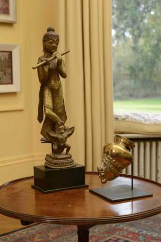 An Indian gilt-bronze figure,