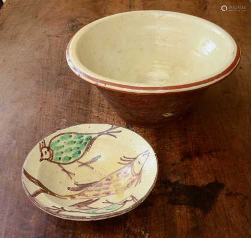 A large glazed stoneware bowl,