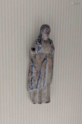 A carved wooden figure of the Virgin Mary,