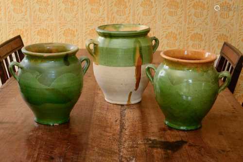 A pair of Continental glazed stoneware pots,