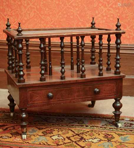 A Victorian walnut canterbury,