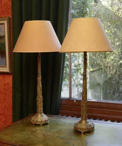 A pair of Gothic Revival brass table lamps,