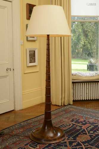 A mahogany standard lamp,