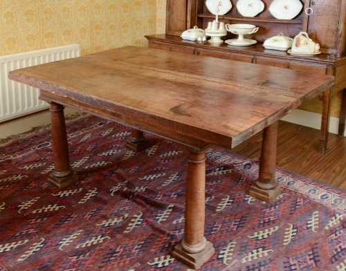 A walnut and fruitwood table,
