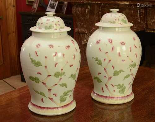 A pair of Chinese porcelain baluster vases and covers,