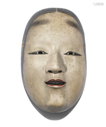 A CARVED WOOD NOH MASK OF KO-OMOTE ('LITTLE FACE') Anonymous...