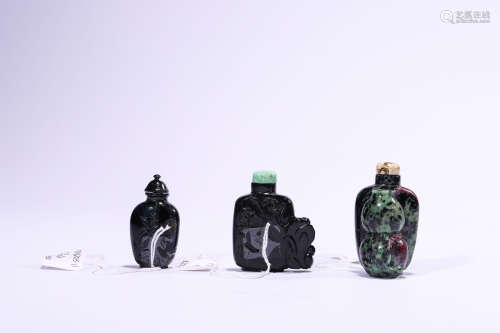 A Group of Three Snuff Bottles