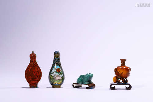 A Group of Four Snuff Bottles and Carvings