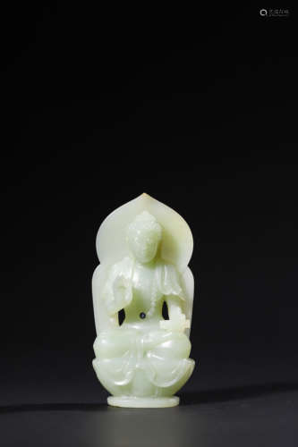 A Carved Jade Figure of a Seated Buddha