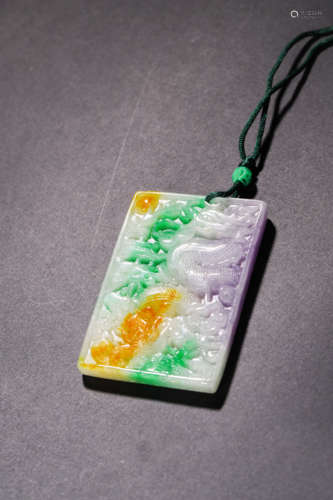 A Carved Tri-coloured Pendent