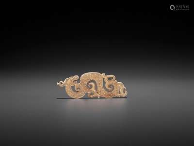A SMALL JADE PENDANT DEPICTING A COILED DRAGON
