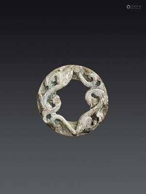 A HAN JADE RING ORNAMENT WITH COILED CHILONG