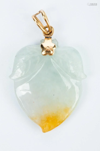 A JADEITE PENDANT WITH 14K GOLD INLAY