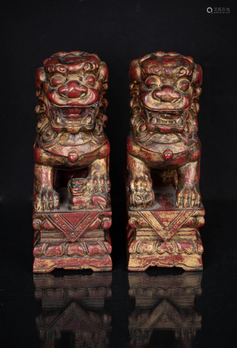 LATE QING PAIR OF WOODEN CARVED LIONS