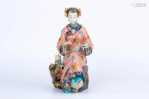 20TH CENTURY CARVED PORCELAIN FIGURE