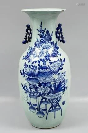 A WHITE AND BLUE VASE