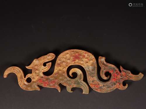 A JADE DRAGON SHAPED ORNAMENT 