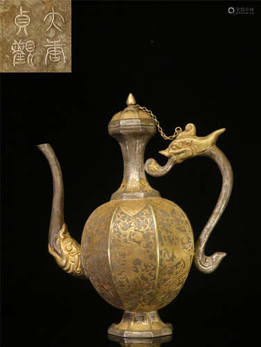 A CHINESE GILT SILVER WINE EWER 