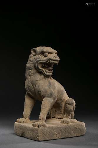 A RED SANDSTONE FIGURE A LION 