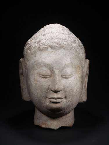 A QINGZHOU HEAD OF BUDDHA 