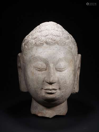 A QINGZHOU HEAD OF BUDDHA 