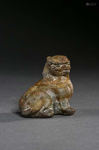 A SOAPSTONE FIGURE A LION 