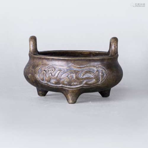 A TRIPOD BRONZE CENSER