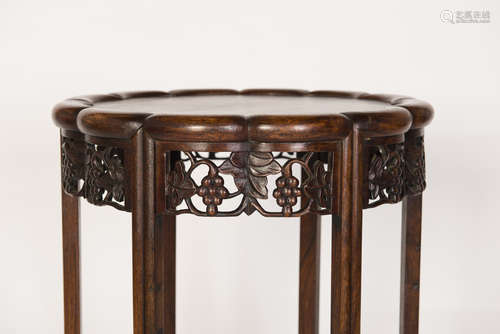 A CHINESE CYLINDERICAL HARDWOOD STOOL