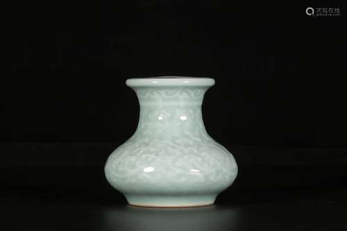 A CELADON-GLAZED INTERLOCKING LOTUS INCENSE INSERTED