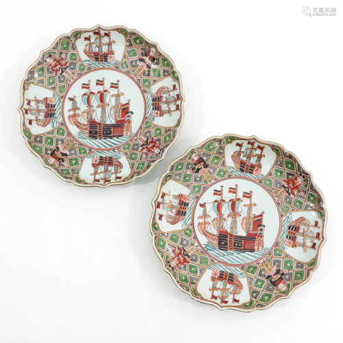 A Pair of Polychrome Decor Plates