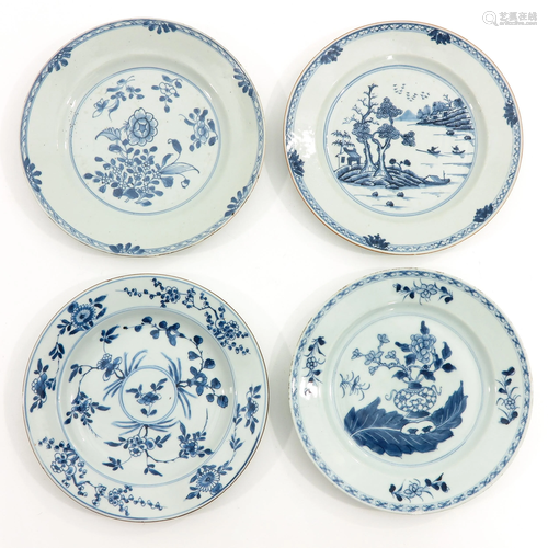 A Collection of 4 Blue and White Plates