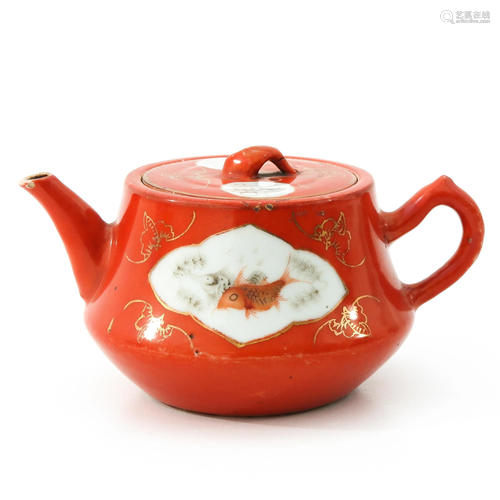 An Orange and Gilt Teapot