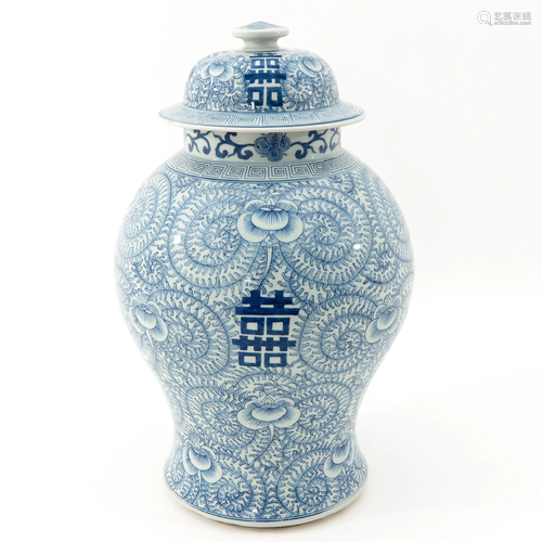 A Blue and White Vase with Cover