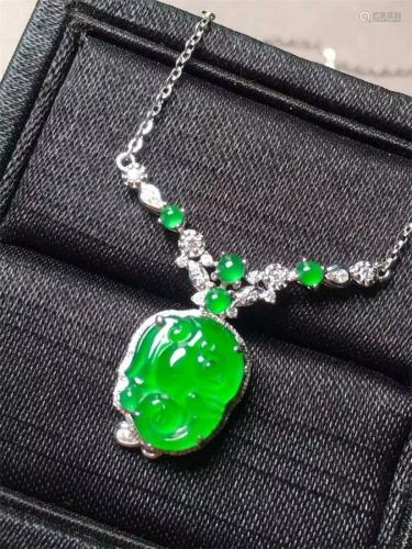 A Chinese Carved Jadeite Necklace