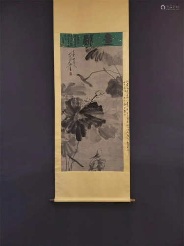 A Chinese Scroll Painting Depicts Flowers and Birds