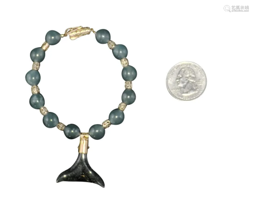 JADEITE WHALE TAIL, BEAD AND GOLD BRACELET