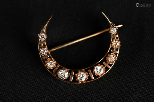 Half moon brooch