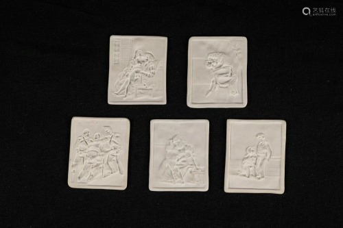 Set of five biscuit porcelain plaques
