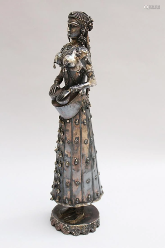 Oriental silver tambourine figure