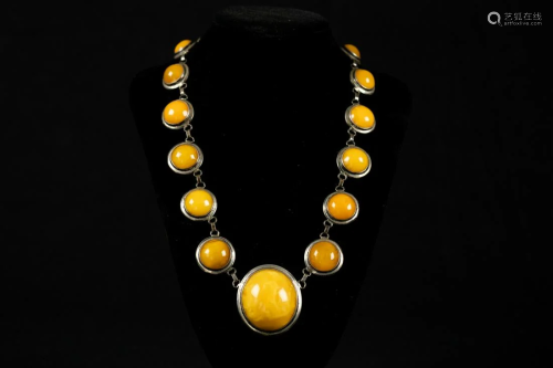 Silver necklace with amber