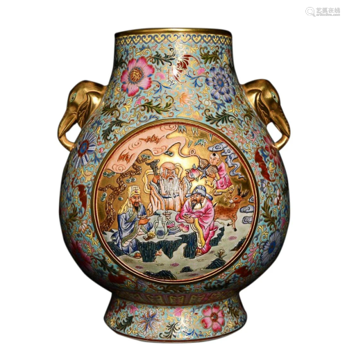 FAMILLE ROSE 'GUANYIN' ZUN VASE WITH ELEPHANT HANDLES