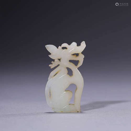 A Carved White Jade Dragon Pendant