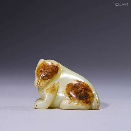 A Russet White Jade Carving Of A Auspicious Beast