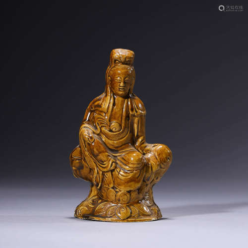A Yellow-Glazed Pottery Statue Of Guanyin