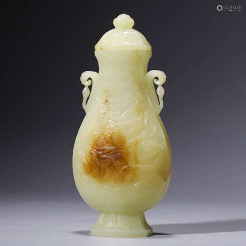 A Carved White Jade Dragon Double-Eared Vase