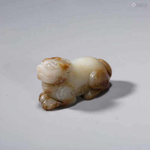 A Russet Jade Carving Of A Beast