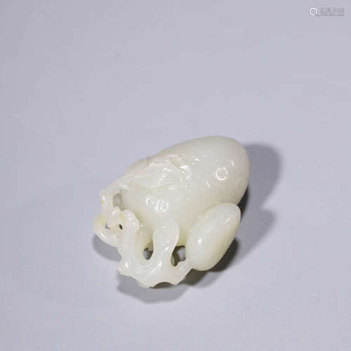 A Carved White Jade Lychee-Formed Ornament